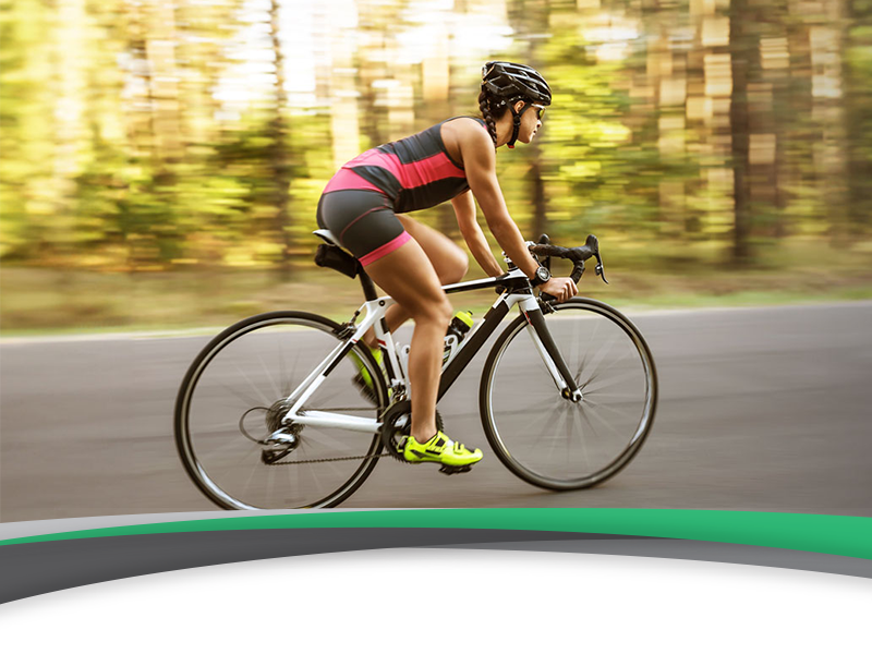 woman cycling on a highway